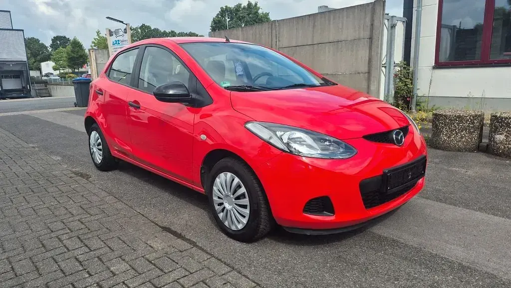 Gebraucht Mazda 2 Independence 75 PS (55 kW) 2009 Rot Kleinwagen