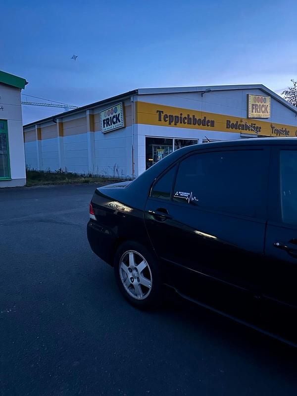 Gebraucht Mitsubishi Lancer 98 PS (72 kW) 2007 Schwarz Limousine