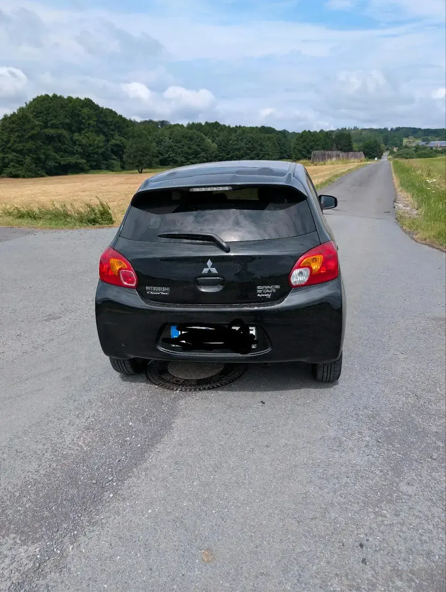 Gebraucht Mitsubishi Space Star 80 PS (58 kW) 2013 Schwarz Van / Kleinbus