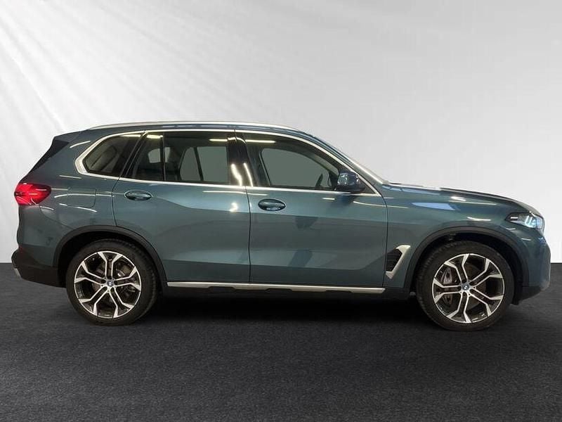 Second-hand BMW X5 Efficient Dynamics 489 CP (359 kW) 2024 Albastru SUV