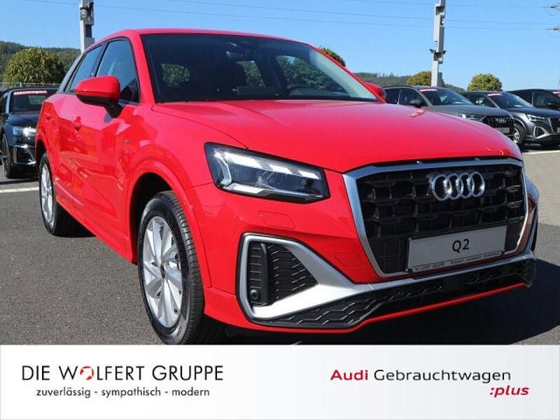 Gebraucht Audi Q2 S-Line 150 PS (110 kW) 2023 Tangorot metallic SUV