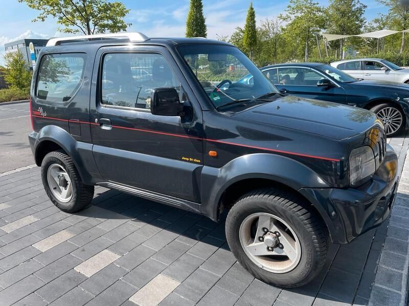 Schwarz Gebraucht 2003 Suzuki Jimny Style SUV | 7.500 € (Fairer Preis) - Bild 1/4