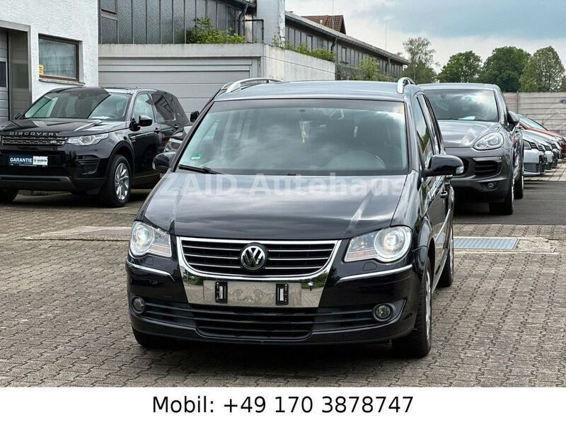 Schwarz Gebraucht 2007 VW Touran Highline Van / Kleinbus | 6.999 € (Teuer) - Bild 1/4