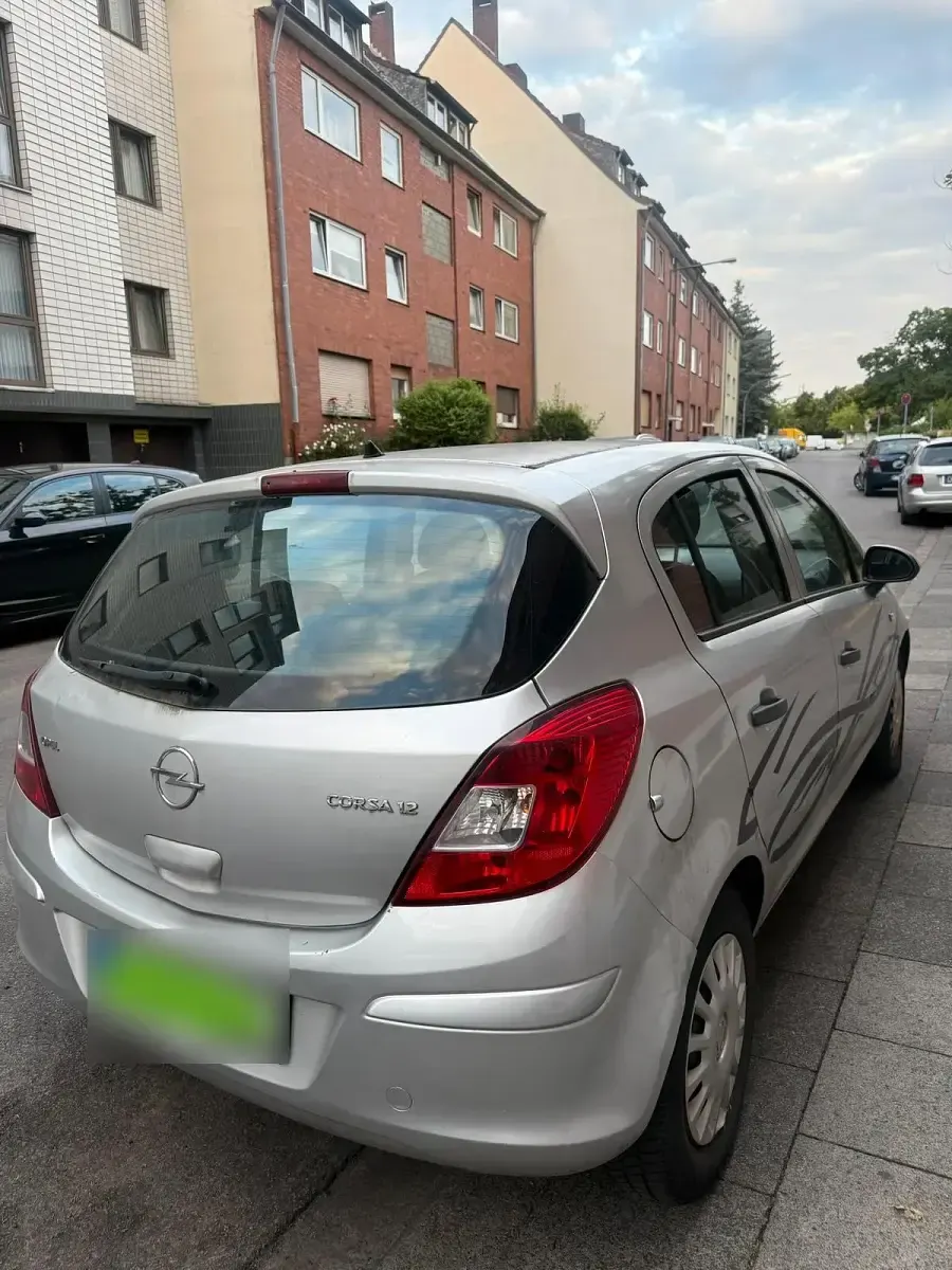 Gebraucht Opel Corsa 80 PS (58 kW) 2009 Silber Kleinwagen