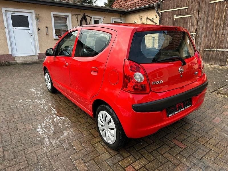 Gebraucht Nissan Pixo Visia 68 PS (50 kW) 2009 Rot Kleinwagen