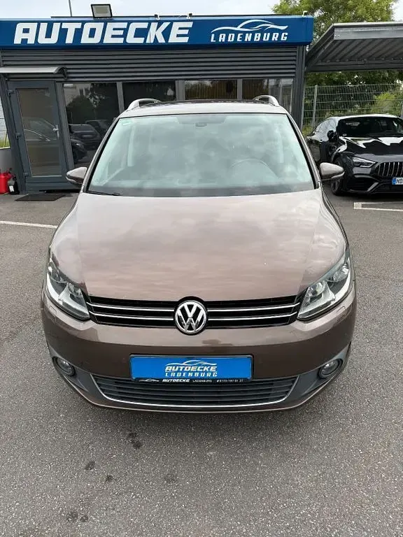 Gebraucht VW Touran Life 150 PS (110 kW) 2013 Braun Van / Kleinbus