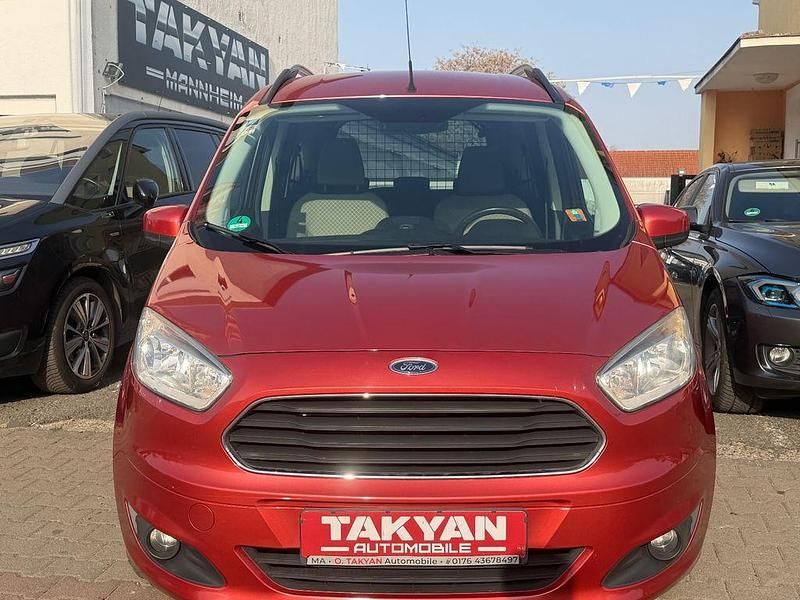 Gebraucht Ford Tourneo Courier Titanium 101 PS (74 kW) 2014 Orange Van / Kleinbus
