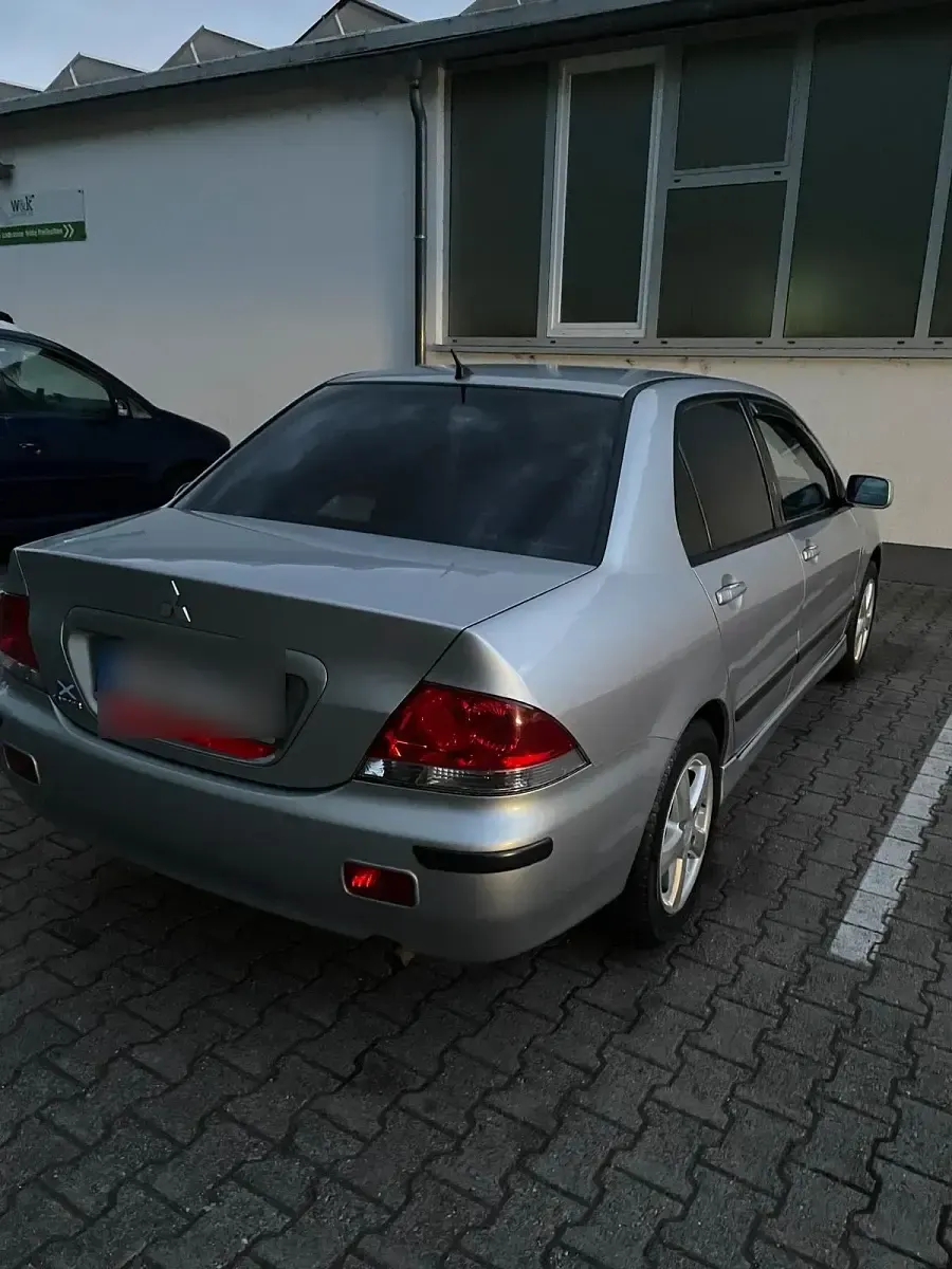 Gebraucht Mitsubishi Lancer 98 PS (72 kW) 2003 Silber Limousine