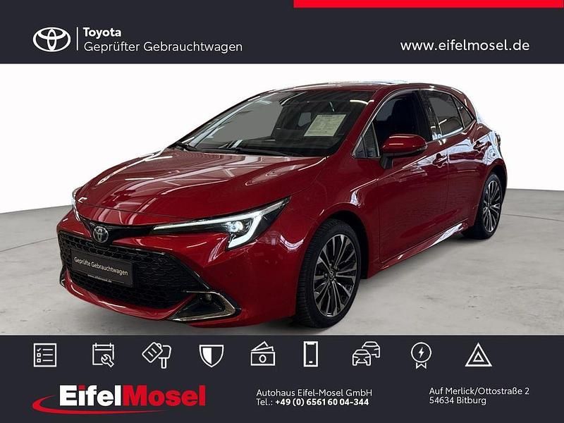 Emotional red metallic Gebraucht 2023 Toyota Corolla Team Limousine | 23.790 € (Fairer Preis) - Bild 1/4