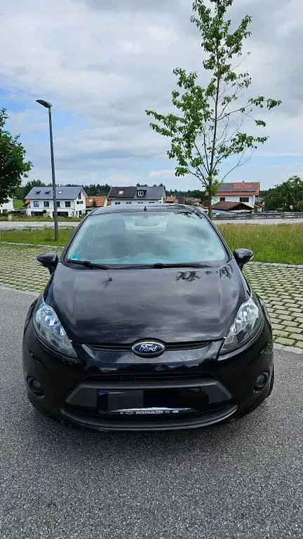 Gebraucht Ford Fiesta 82 PS (60 kW) 2011 Schwarz Limousine