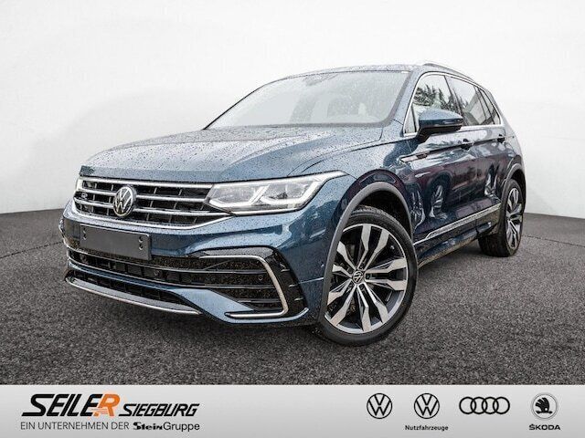 Blau / nightshade blue Gebraucht 2023 VW Tiguan R-line SUV | 44.450 € (Teuer) - Bild 1/4