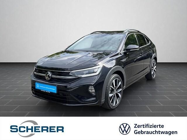 Deep black perleffekt (metallic) Gebraucht 2022 VW Taigo R-line SUV | 22.290 € (Fairer Preis) - Bild 1/4