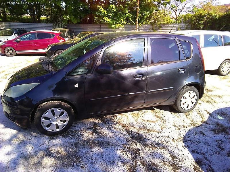 Second-hand Mitsubishi Colt 95 CP (69 kW) 2008 Negru Berlinǎ