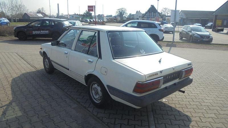 Gebraucht Mazda 323 60 PS (44 kW) 1983 Weiß Limousine