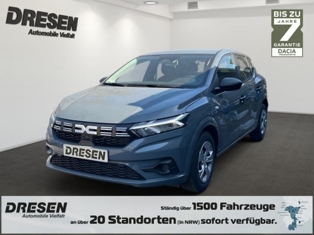 Grau Gebraucht 2022 Dacia Sandero Essentiel Kleinwagen | 15.855 € (Fairer Preis) - Bild 1/4