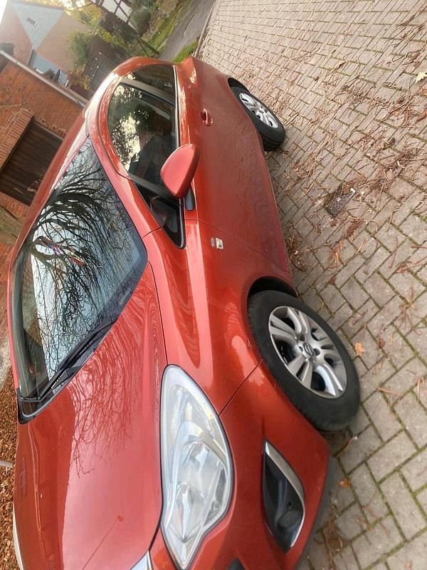 Orange Gebraucht 2011 Opel Corsa Kleinwagen | 1.100 € (Fairer Preis) - Bild 1/4