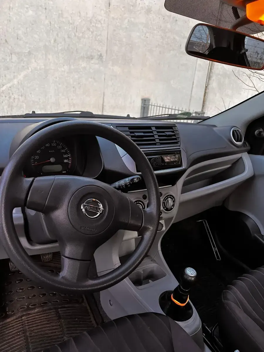 Gebraucht Nissan Pixo 68 PS (50 kW) 2010 Schwarz Kleinwagen
