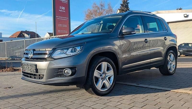 Grau Gebraucht 2013 VW Tiguan Sportline SUV | 9.990 € (Superpreis) - Bild 1/4