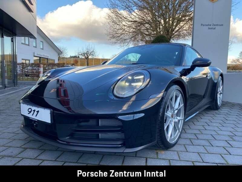 Tiefschwarzmetallic Gebraucht 2025 Porsche 911 Carrera Coupé | 131.555 € (Superpreis) - Bild 1/4