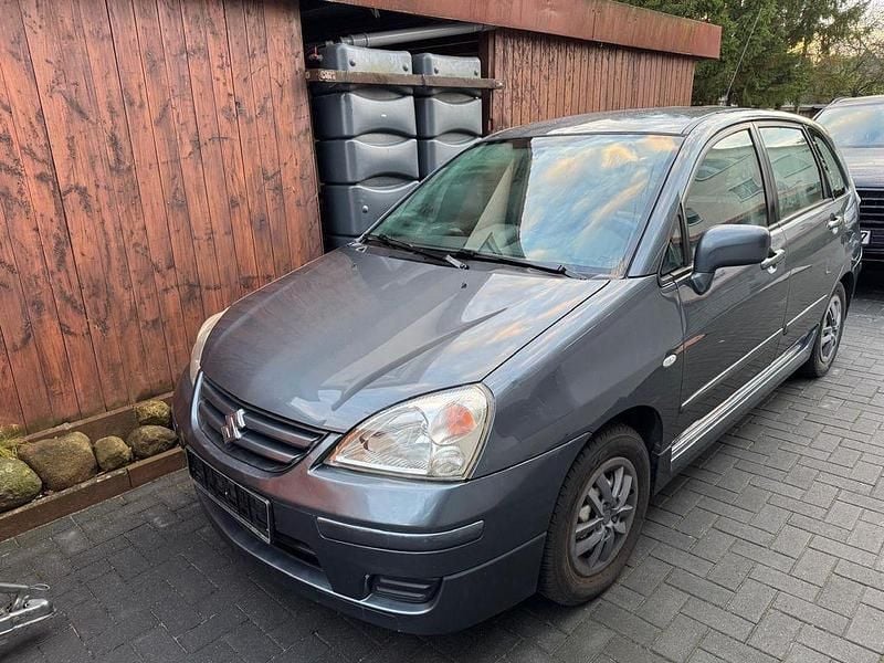 Grau Gebraucht 2005 Suzuki Liana Limousine | 1.200 € - Bild 1/4