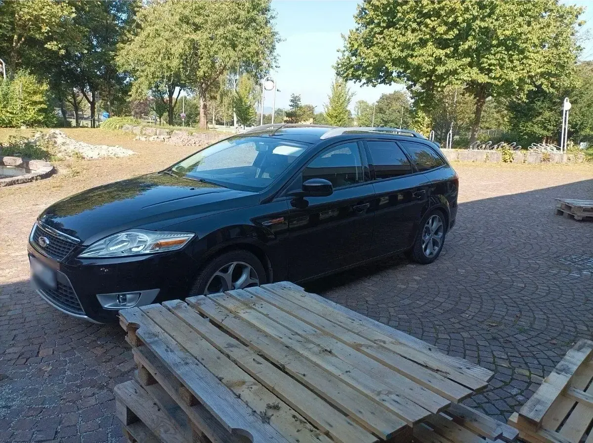 Używany Ford Mondeo 140 KM (102 kW) 2010 Czarny Kombi