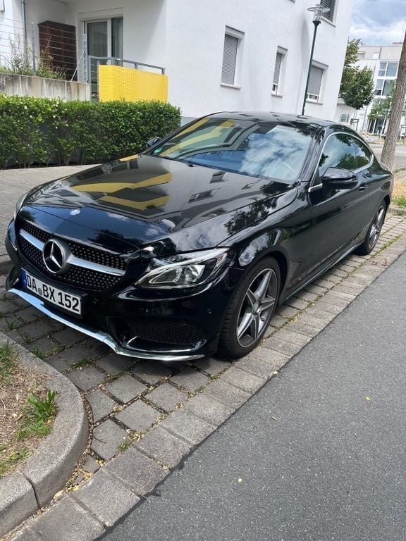 Schwarz Gebraucht 2015 Mercedes C180 AMG line Coupé | 18.500 € (Fairer Preis) - Bild 1/4