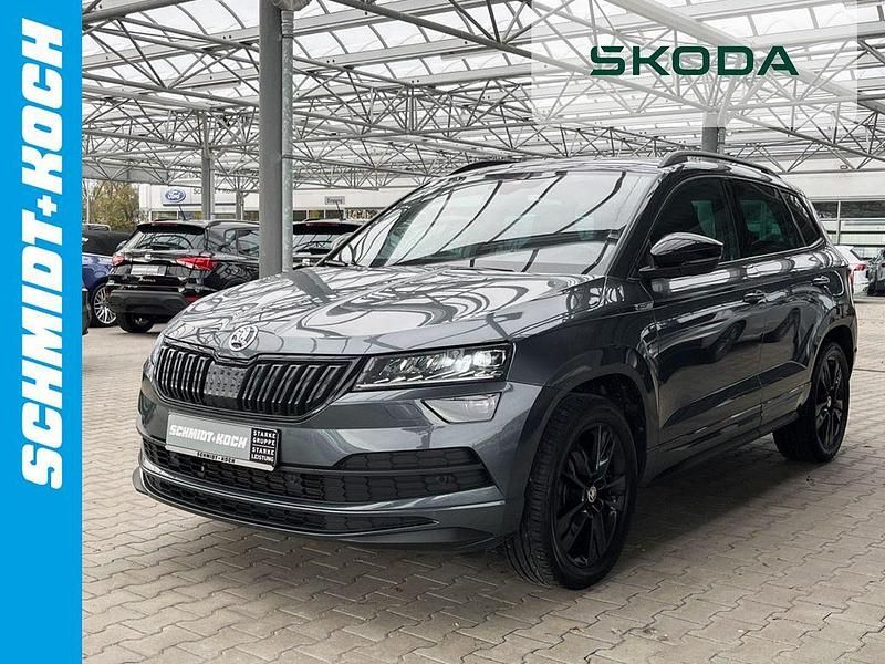 Grau Gebraucht 2020 Skoda Karoq SportLine SUV | 28.980 € (Fairer Preis) - Bild 1/4