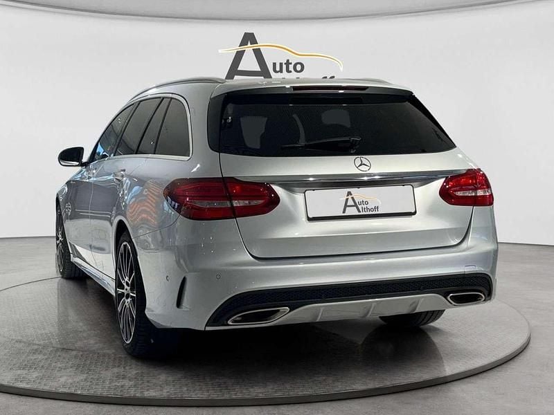 Gebraucht Mercedes C400 AMG line 333 PS (244 kW) 2018 Iridiumsilber  metallic Kombi