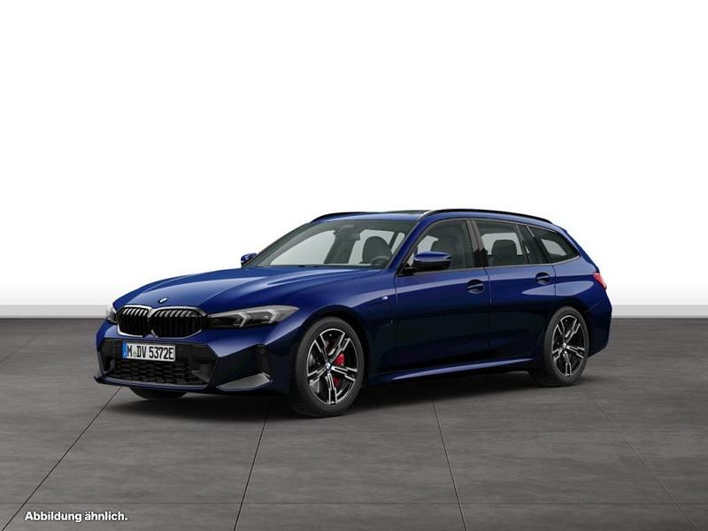 Blau Gebraucht 2024 BMW 330e Kombi | 53.666 € - Bild 1/4