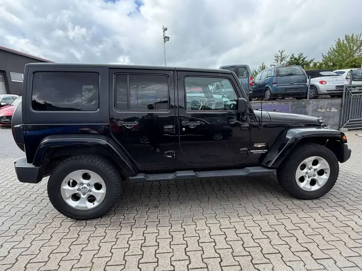 Gebraucht Jeep Wrangler Unlimited Sahara 200 PS (147 kW) 2013 Black clear coat SUV