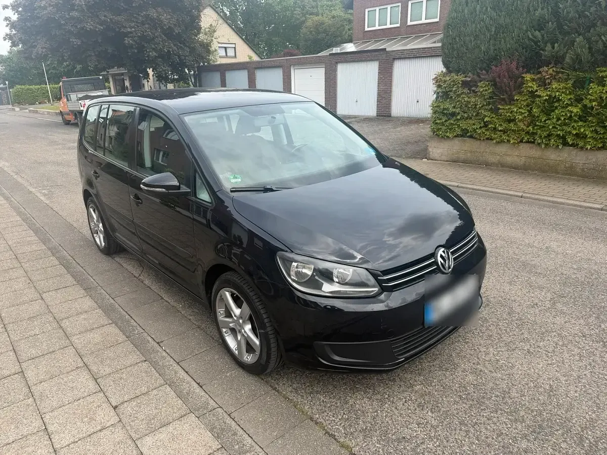 Używany VW Touran 105 KM (77 kW) 2011 Czarny Minivan