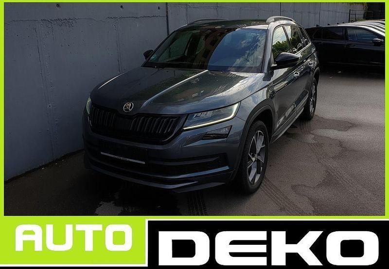 Quarzgrau metallic Gebraucht 2020 Skoda Kodiaq SportLine SUV | 25.930 € (Teuer) - Bild 1/4