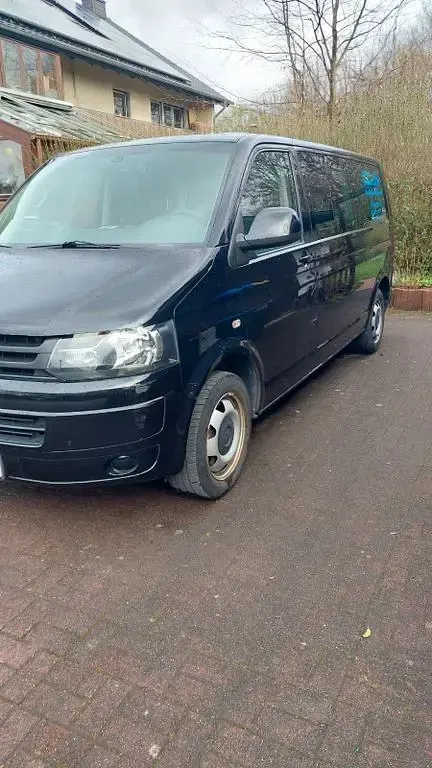 Używany VW Caravelle 179 KM (131 kW) 2012 Czarny Van