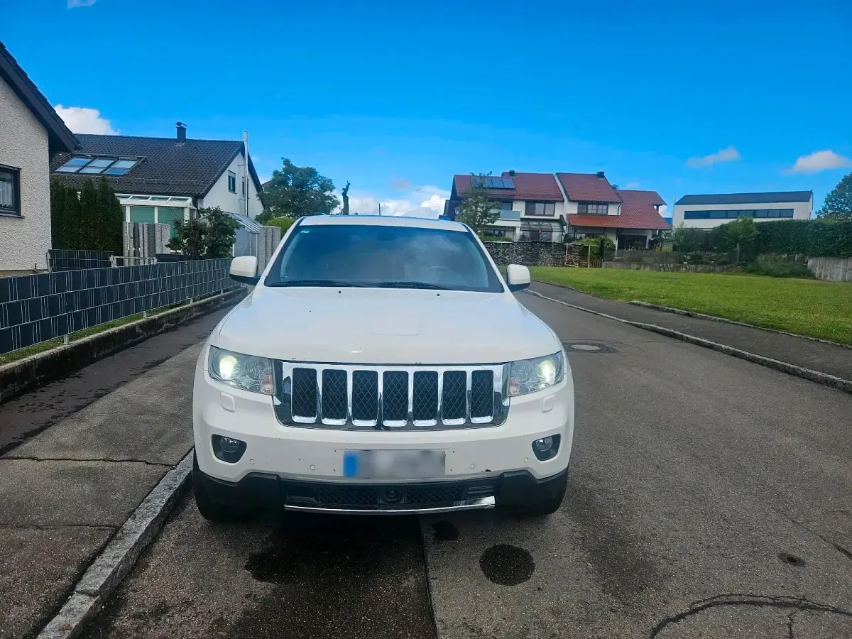 Gebraucht Jeep Grand Cherokee Overland 241 PS (177 kW) 2012 Weiß SUV