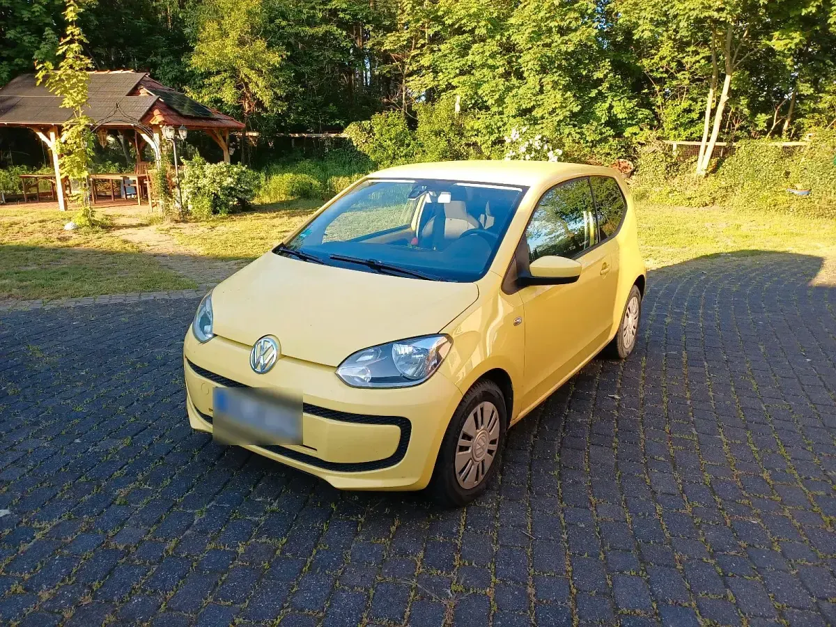 Usado VW up! 60 CV (44 kW) 2014 Amarillo Utilitario