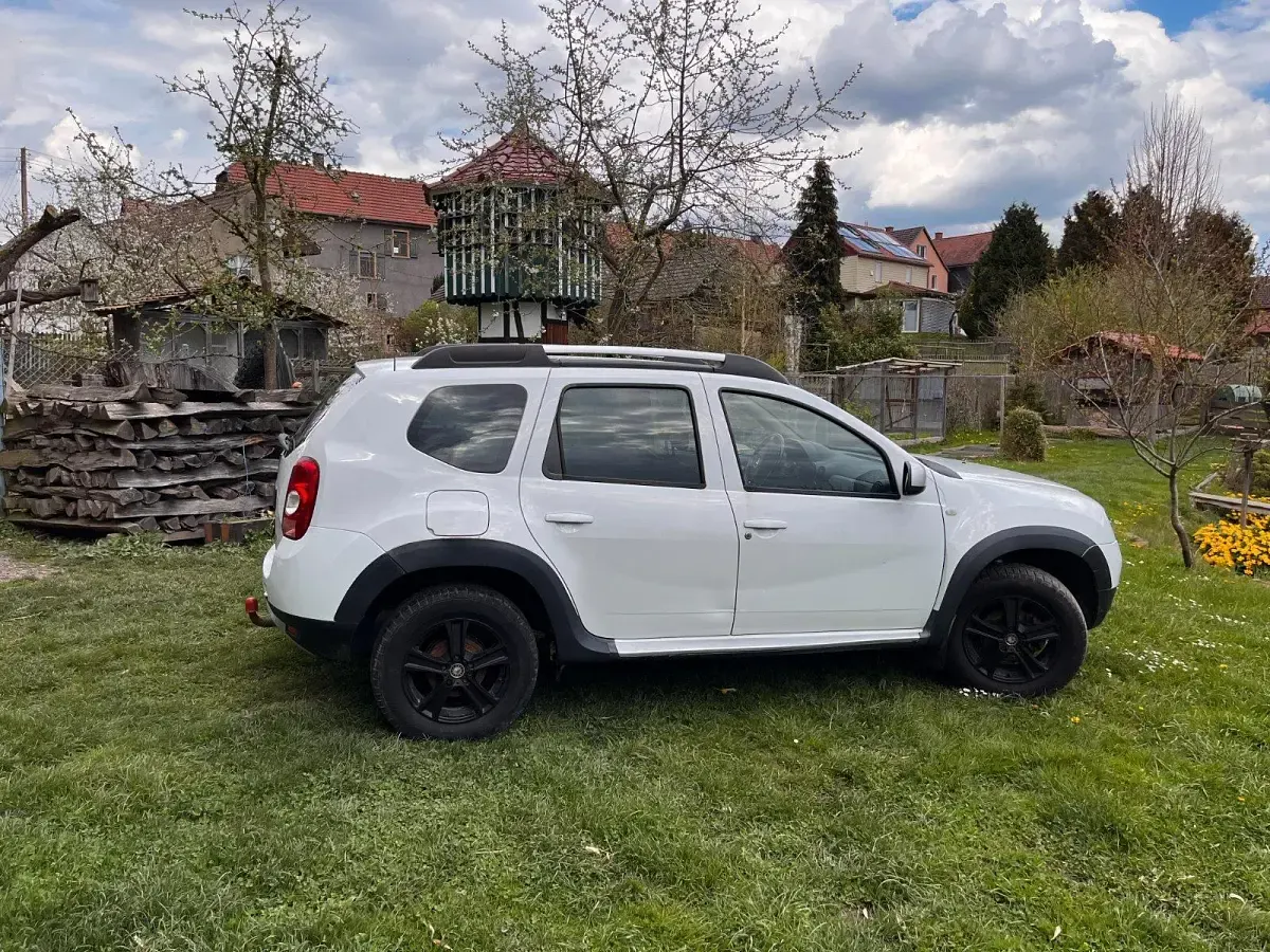 Second-hand Dacia Duster 110 CP (80 kW) 2011 Alb SUV