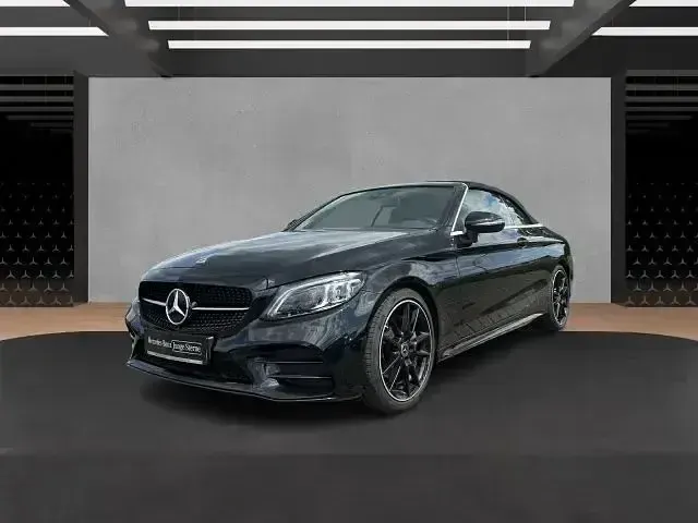 Gebraucht Mercedes C180 AMG 156 PS (114 kW) 2023 Schwarz Cabrio