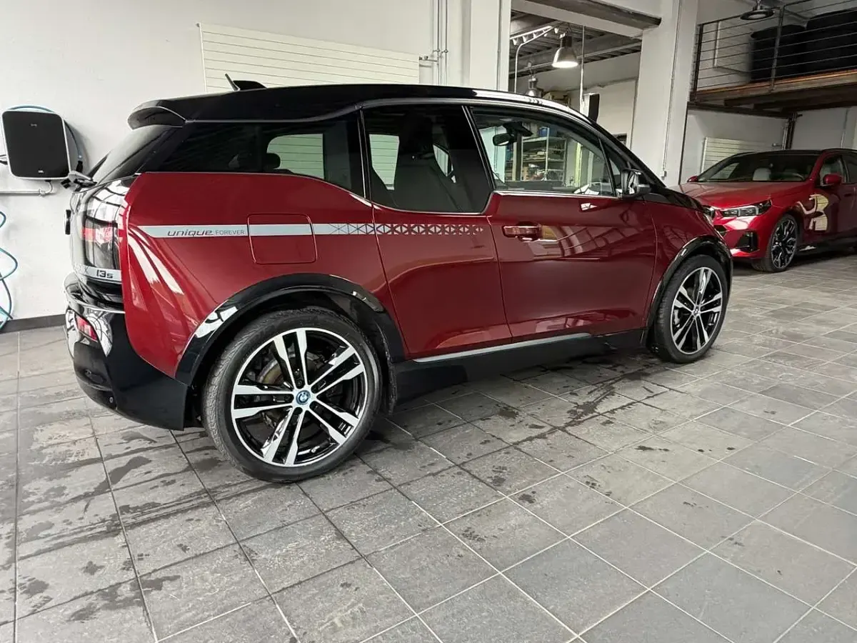 Gebraucht BMW i3 Performance 183 kW (250 PS) 2022 Aventurinrot m.akz. frozen gre Kleinwagen