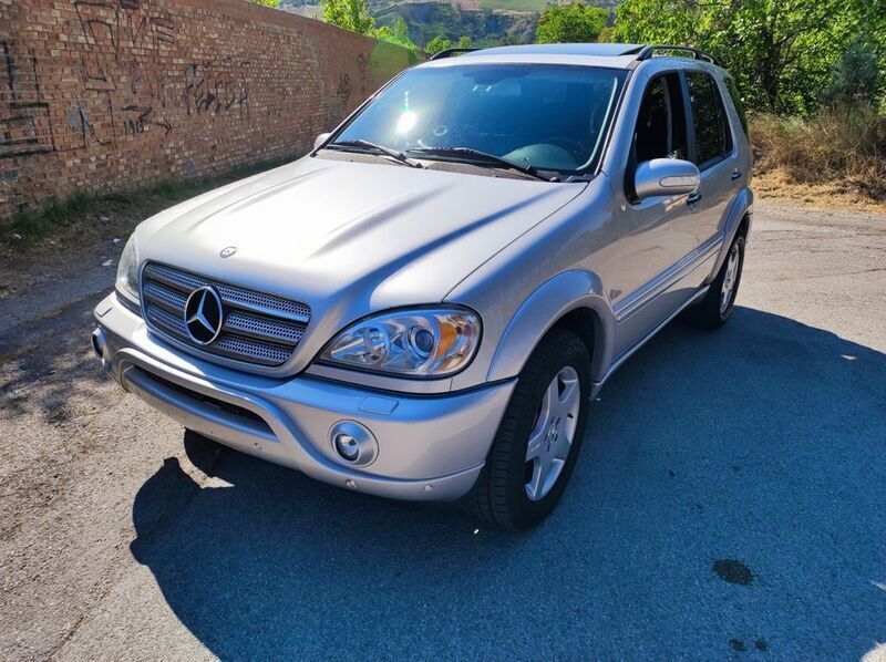 Silber Gebraucht 2002 Mercedes ML55 AMG AMG SUV | 14.500 € - Bild 1/4