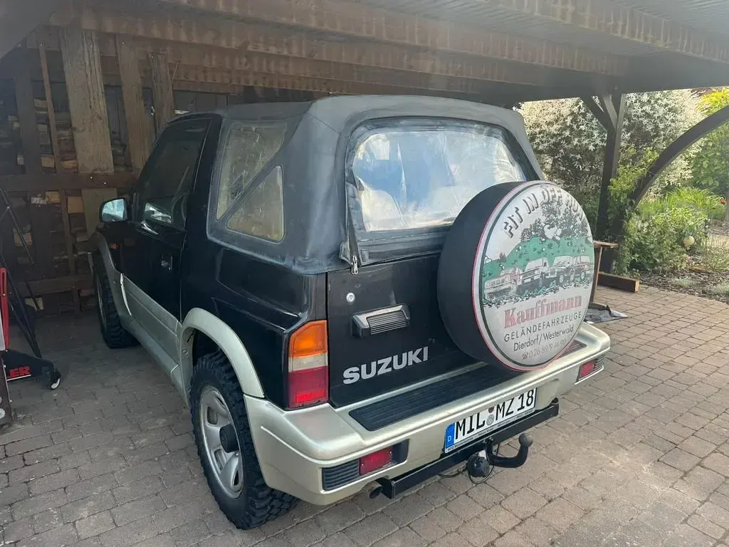 Gebraucht Suzuki Vitara 132 PS (97 kW) 1998 Schwarz Cabrio