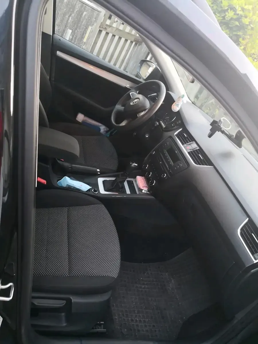 Używany Skoda Octavia 105 KM (77 kW) 2013 Czarny Kombi