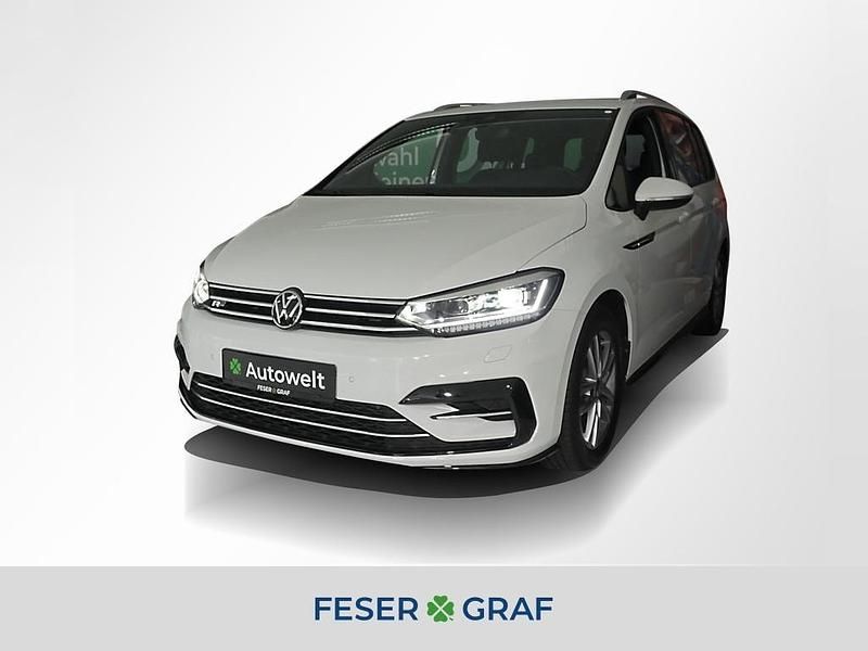 Weiss Gebraucht 2024 VW Touran Comfortline Van / Kleinbus | 38.810 € (Teuer) - Bild 1/4