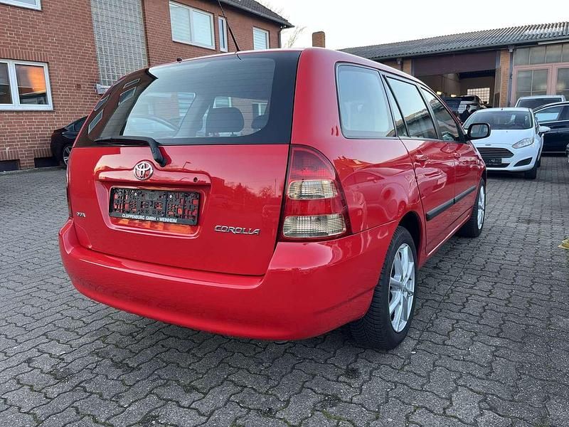 Gebraucht Toyota Corolla 97 PS (71 kW) 2004 Magmarot Kombi