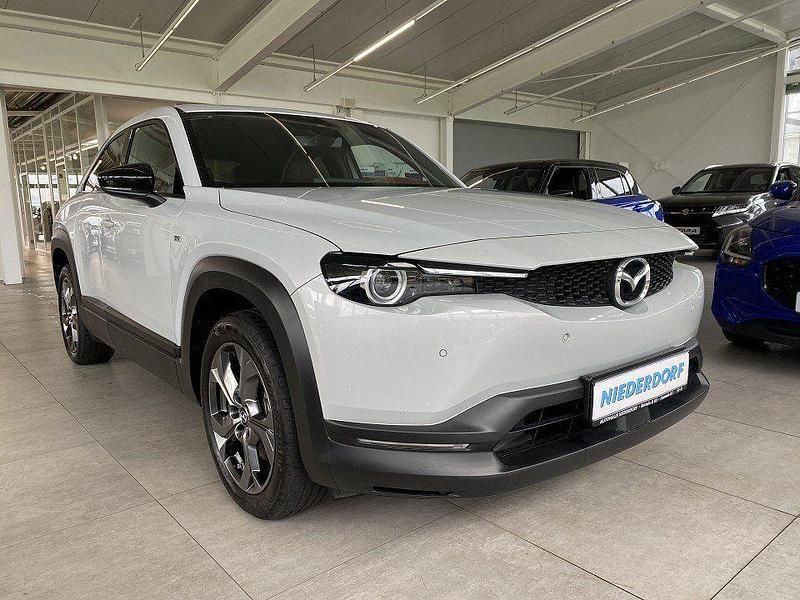 Ceramic white (metallic) Gebraucht 2023 Mazda MX30 Ad'Vantage SUV | 15.990 € (Guter Preis) - Bild 1/4