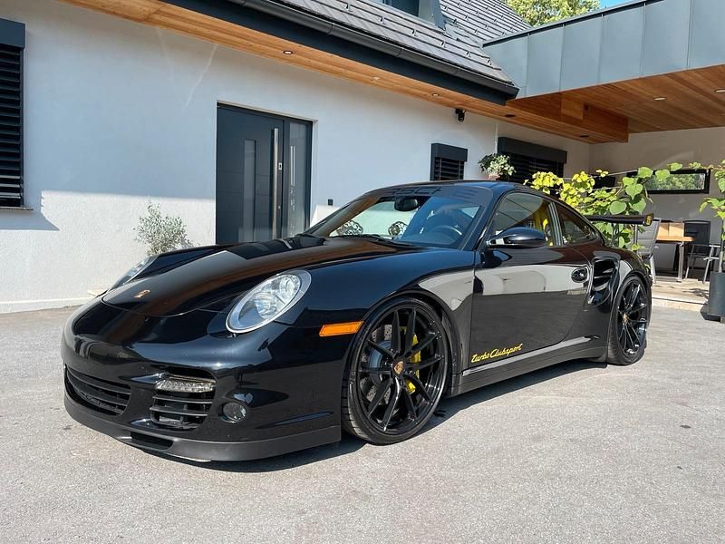 Schwarz Gebraucht 2006 Porsche 997 Coupé | 98.997 € - Bild 1/4