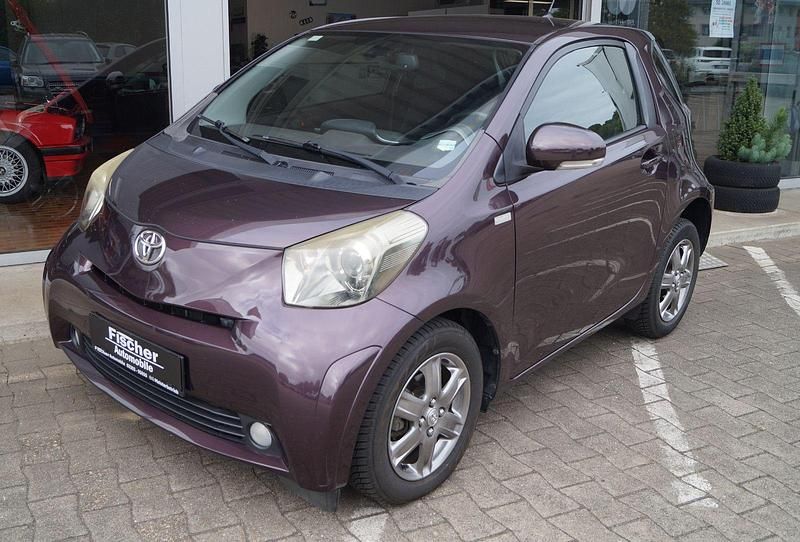 Violet Gebraucht 2009 Toyota iQ Kleinwagen | 3.999 € (Fairer Preis) - Bild 1/4