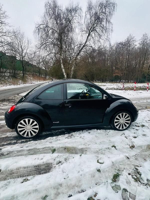 Gebraucht VW New Beetle 102 PS (75 kW) 2010 Schwarz Kleinwagen