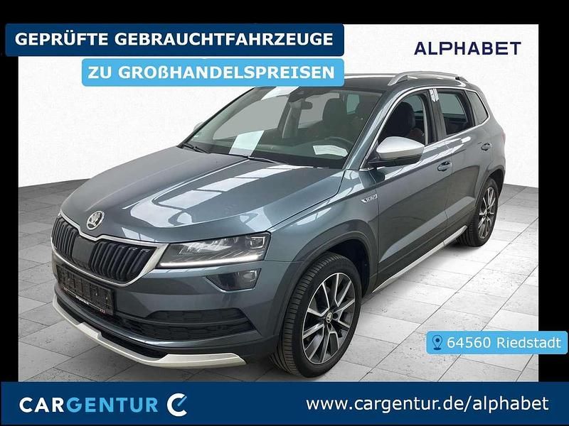 Quarz grau Gebraucht 2020 Skoda Karoq Scout 4x4 SUV | 18.997 € (Fairer Preis) - Bild 1/2