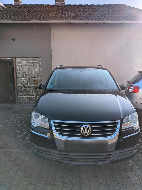 Gebraucht VW Touran 105 PS (77 kW) 2008 Schwarz Van / Kleinbus