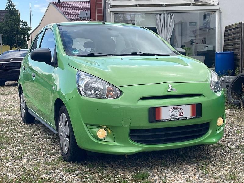 Grün Gebraucht 2014 Mitsubishi Space Star Kleinwagen | 5.999 € (Fairer Preis) - Bild 1/4